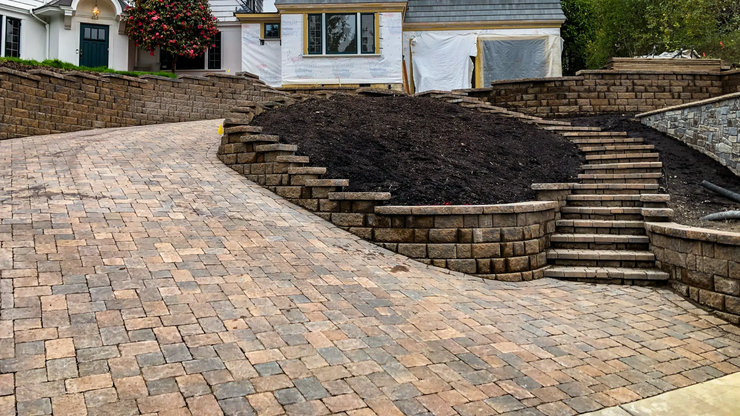 Large natural stone paver plaza and steps