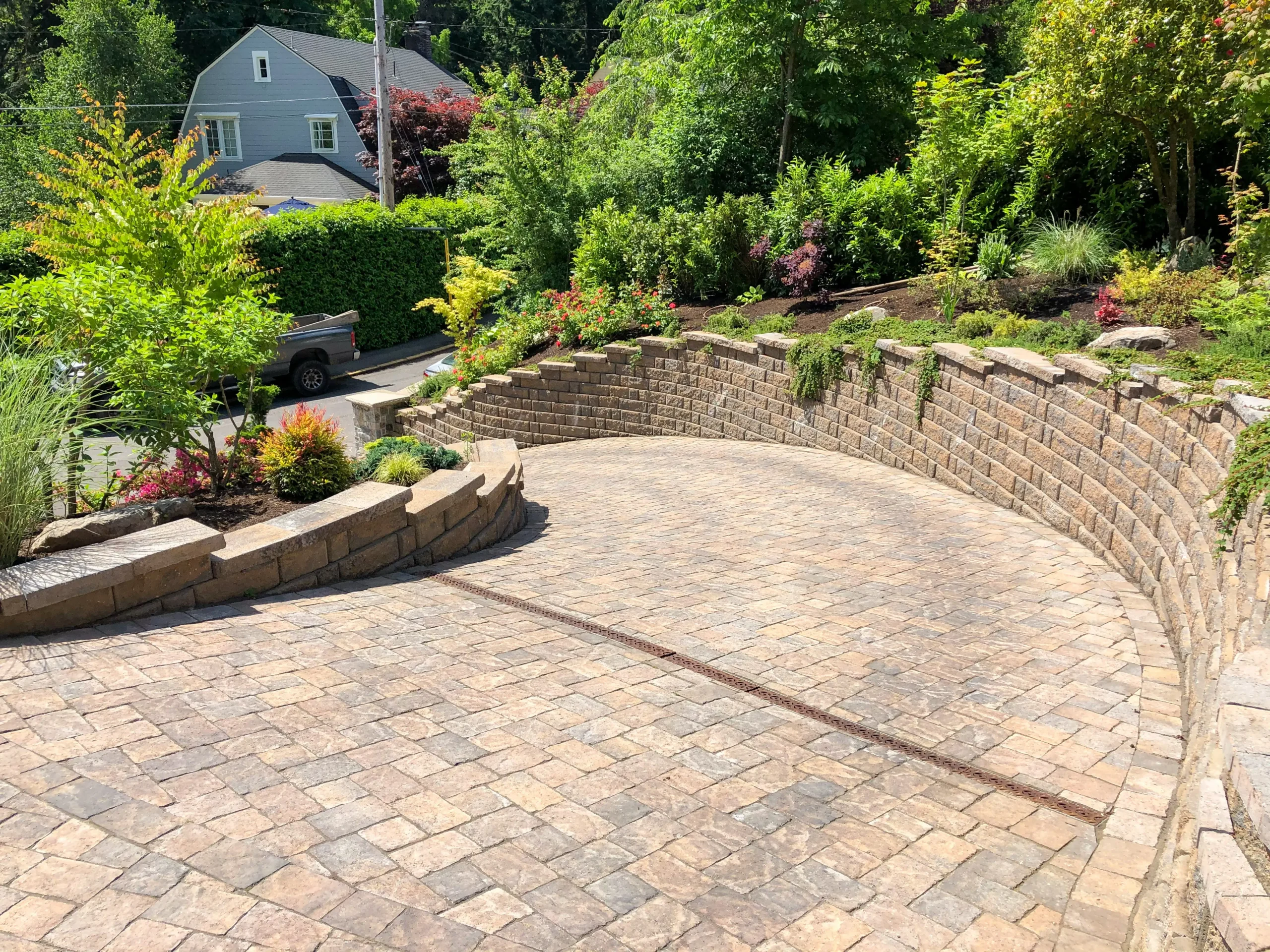 Curved stone garden wall and grade transition