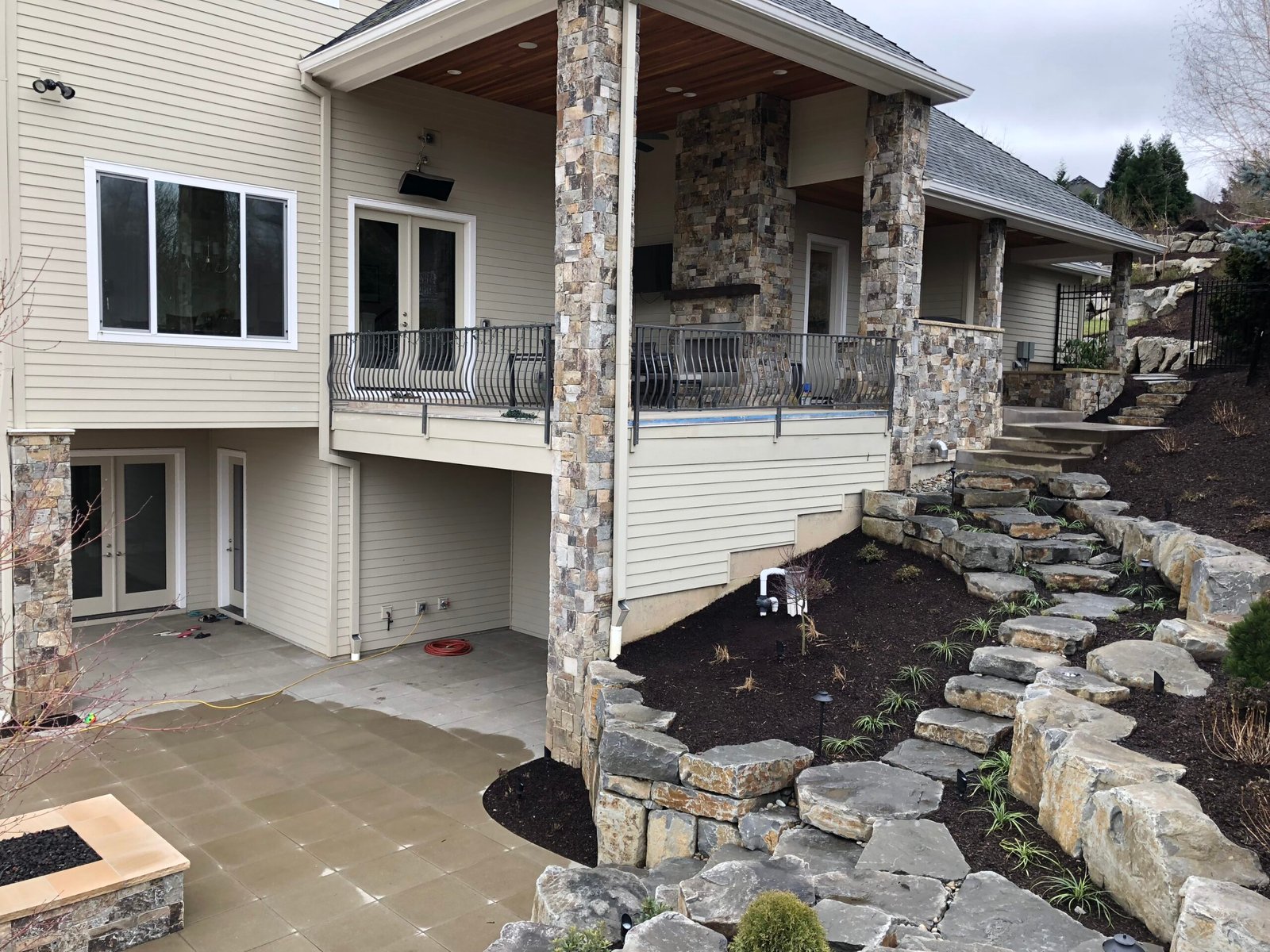 Concrete block retaining wall under construction