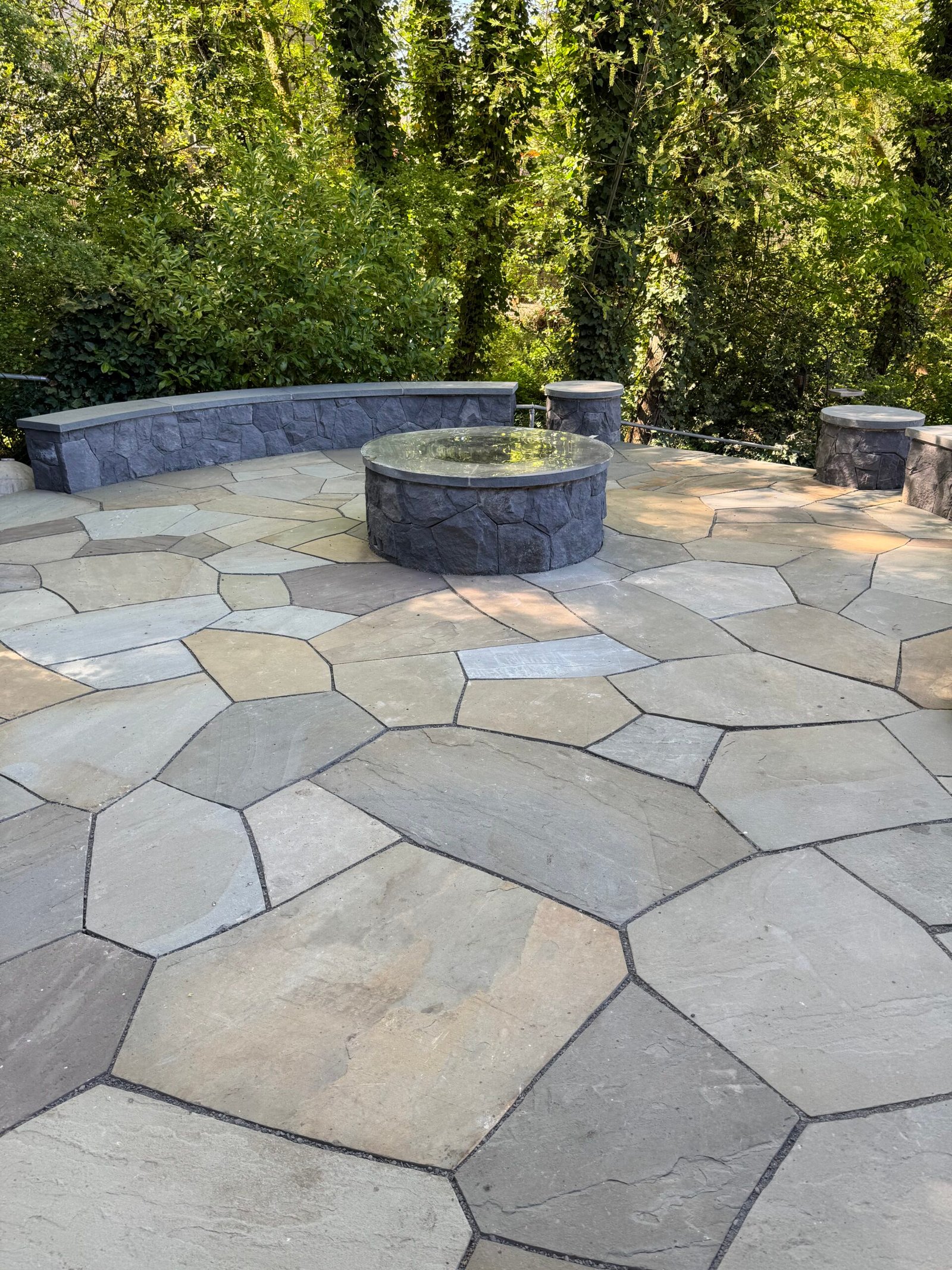Finished natural stone masonry steps and landscaping