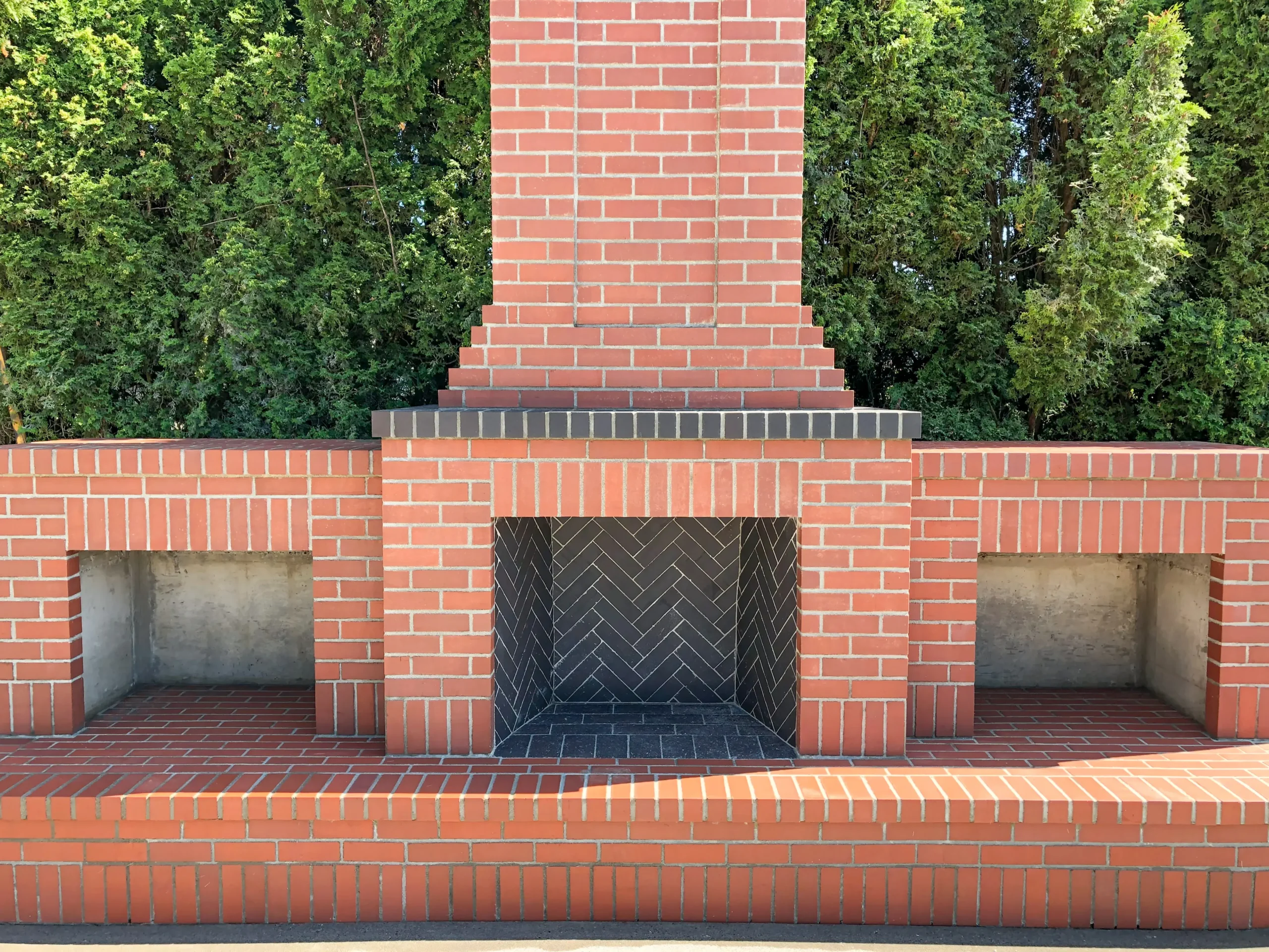 Red brick masonry fireplace and chimney detail